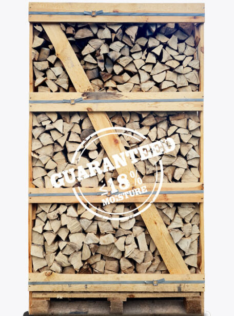 Dry firewood Hornbeam Firewood Stacked in a wooden crate. kiln dried hornbeam firewood